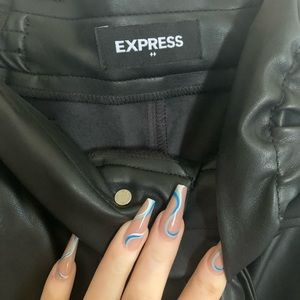 Black leather Express pants with belt never worn